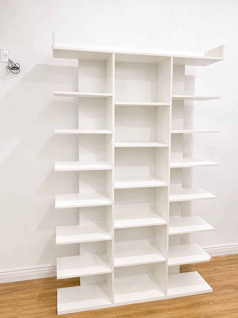 Custom-made board rack for organised shoe and bag storage